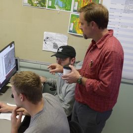 Students and professor in a GIS Lab