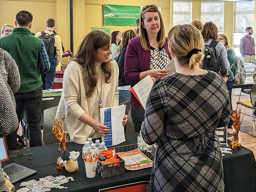 Students at an on campus Teacher Job Fair