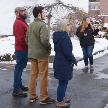 Family on a guided campus tour in the winter