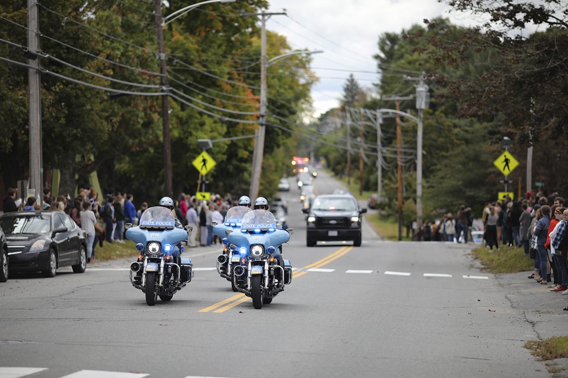 A trio of Maine State Troopers lead the memorial procession of first responders that brought Captain Michael Bell home to Farmington.