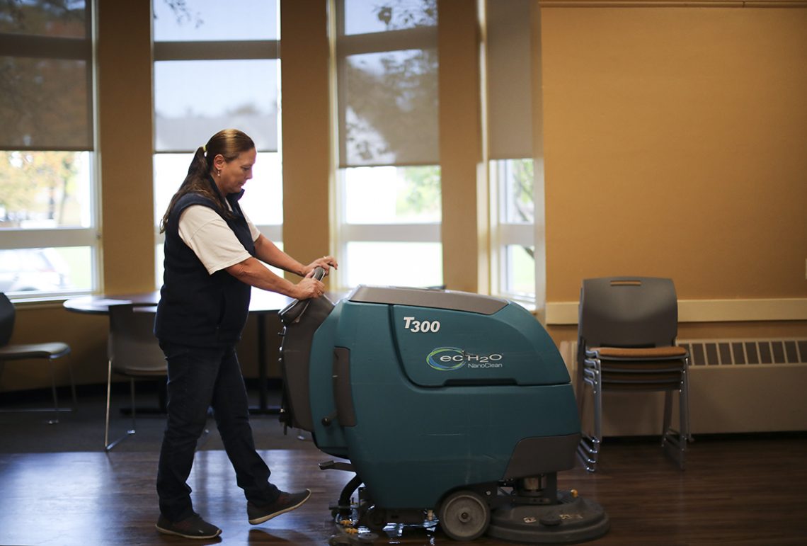 Laura Adams helms the T300 H20 Cleaner in UMF's North Dining Hall
