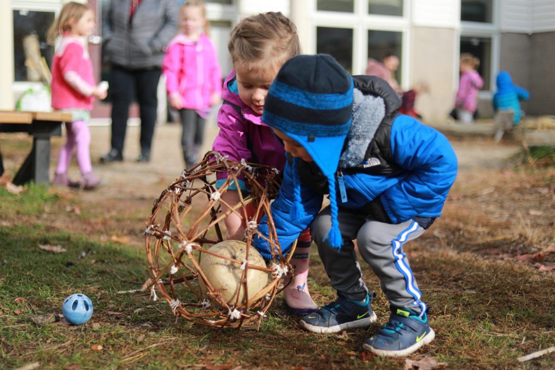 Sweatt-Winter students engage with the "grapevine ball."