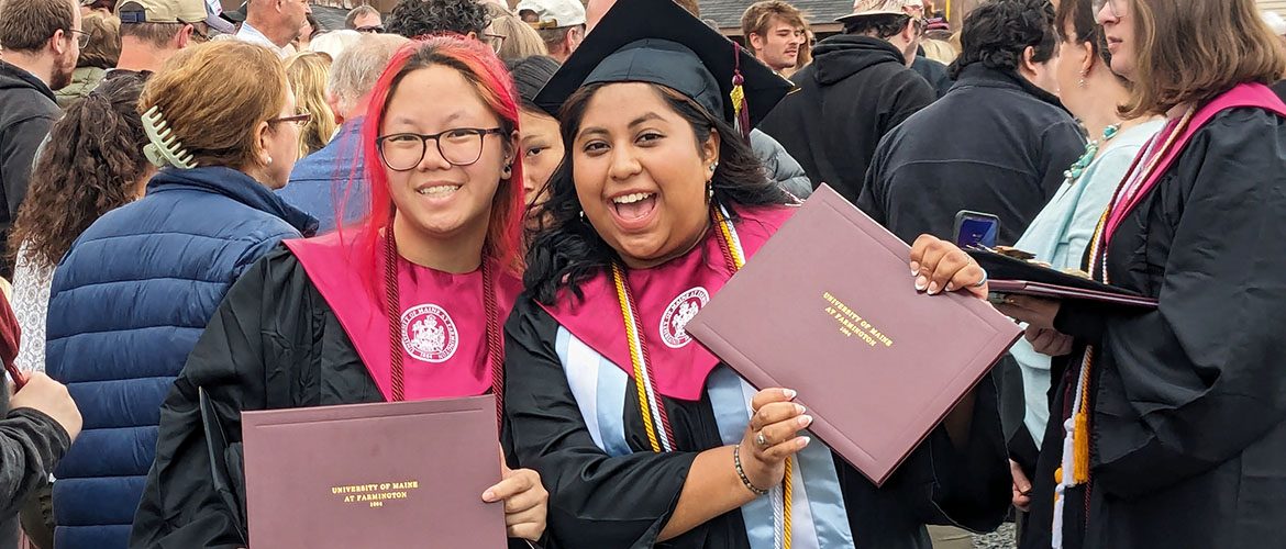 Two UMF graduates at the 2024 Commencement