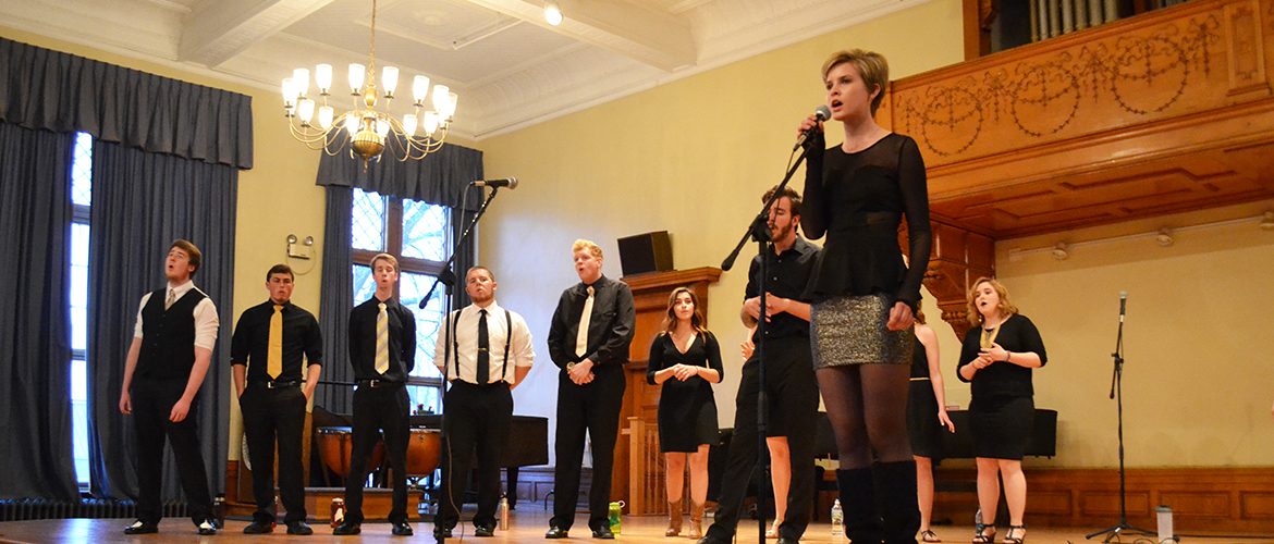 Student Clefnotes singers performing in Nordica Auditorium