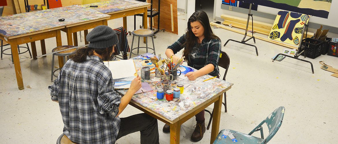 Students making art in an on-campus art studio