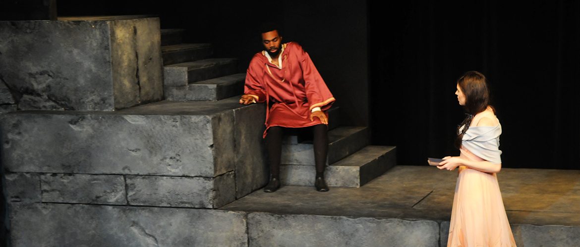 Student Theatre UMF actors performing Hamlet on stage