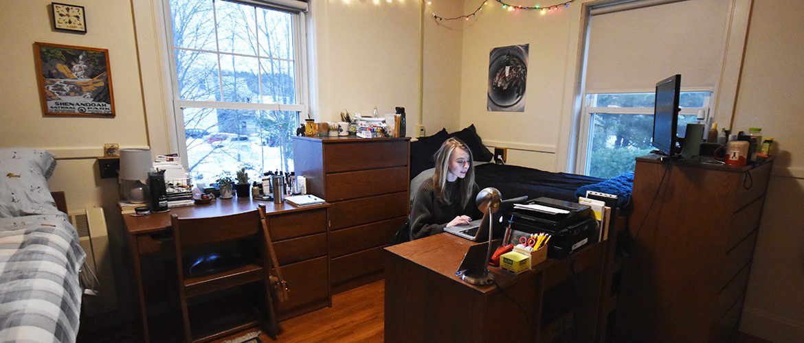 Student in a residence hall room