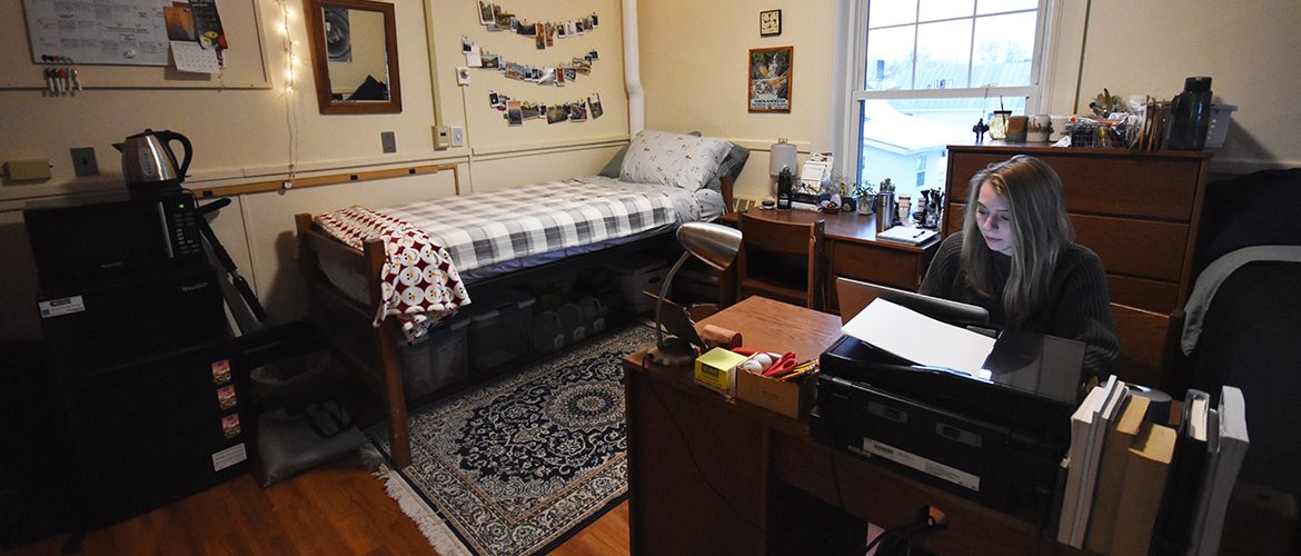 Student in a residence hall room