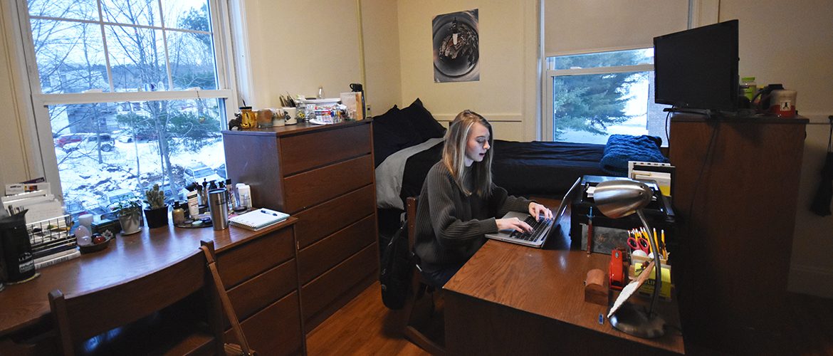 Student in a residence hall room