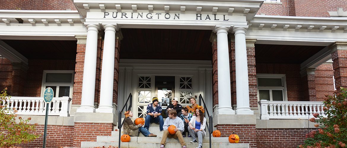 Students hanging out outside Purington Hall residence hall
