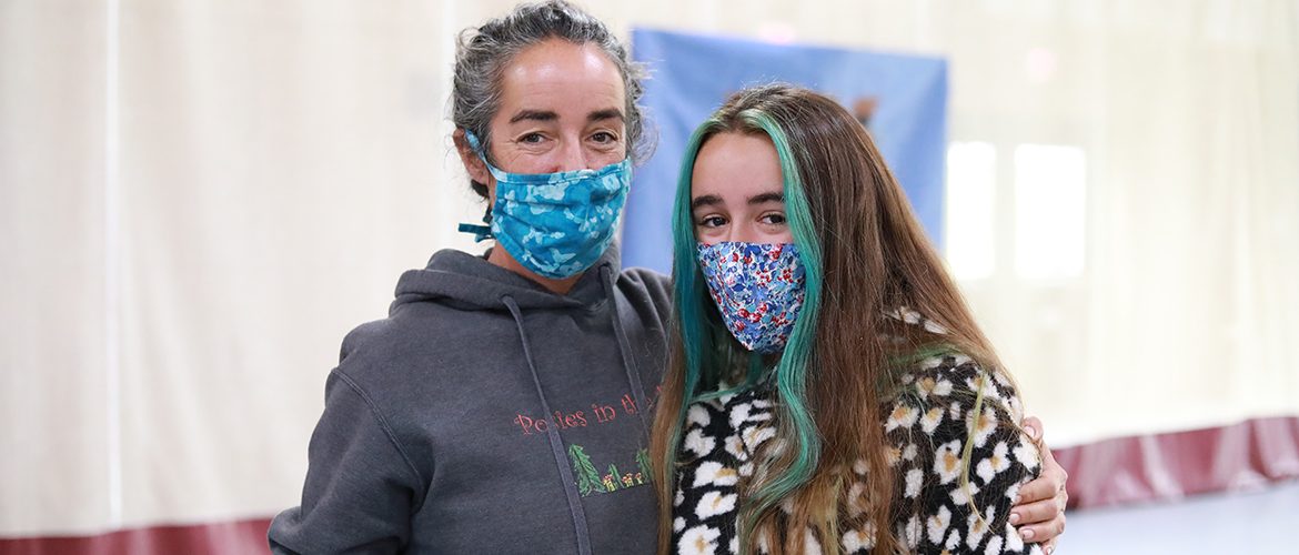 Student and parent in masks at Orientation