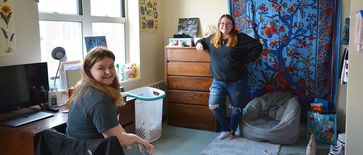 Students in a Scott Hall West Residence Hall room
