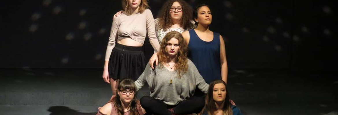 Students in the final scene of the 2019 Spring main Stage production.
