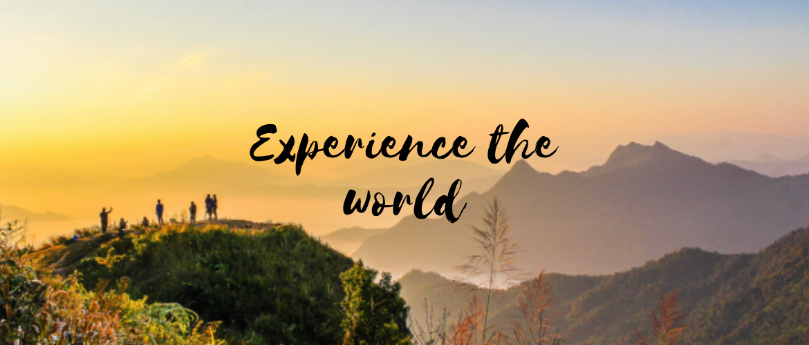 picture of mountain sunset with the words Experience the World