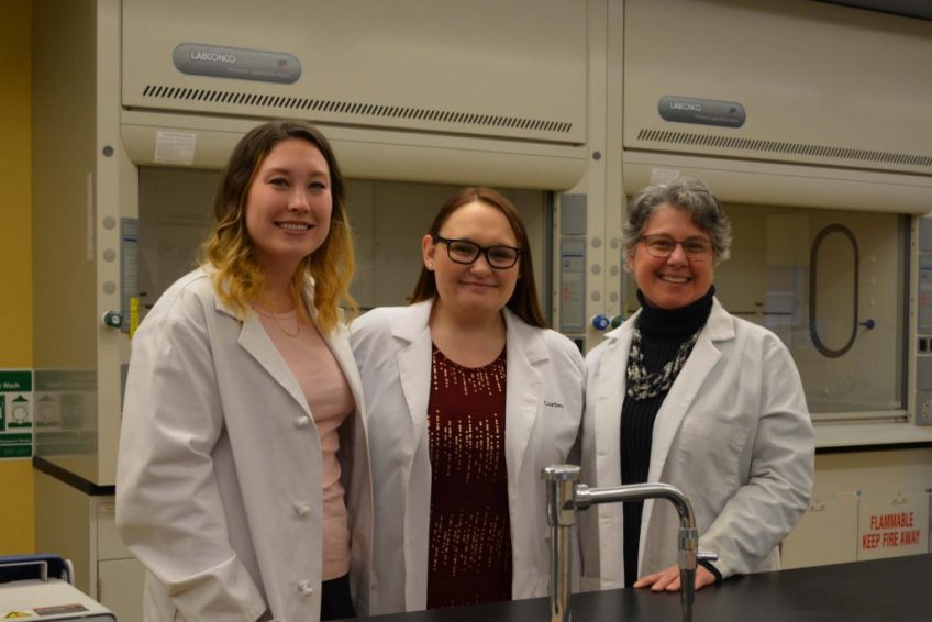 UMF students Brennah O'Connell and Courtney Frost, first participants in UMF Pre-Med Job Shadow program, are joined by Mariella Passarelli, UMF professor of chemistry and director of the pilot program.