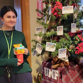 UMF student with the Giving Tree