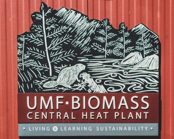 Sign for UMF’s biomass plant that began operation in 2016