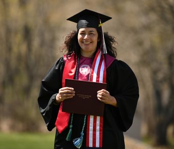 Adult graduate in cap and gown