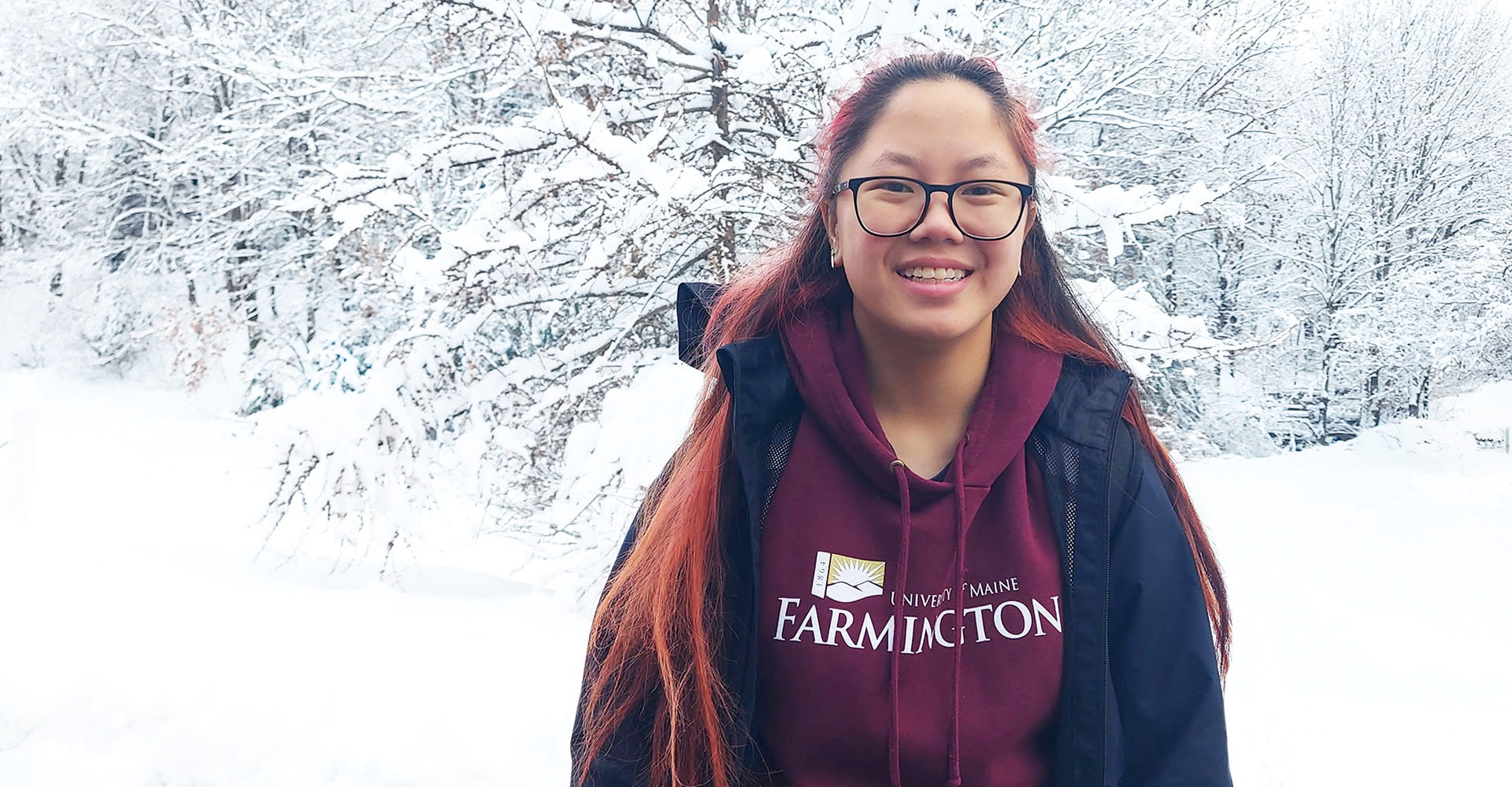Portrait of a UMF student in the snow